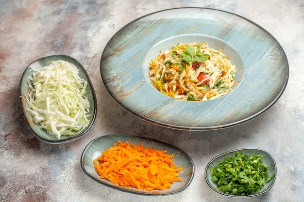 Front view tasty vegetable salad with sliced carrot and cabbage on light background diet photo dish color meal health food