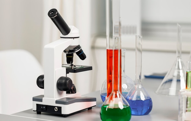 Front view of test tubes and microscope in the lab