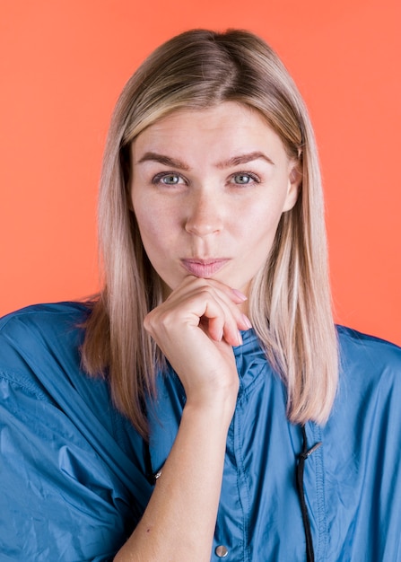 Free photo front view of thoughtful woman