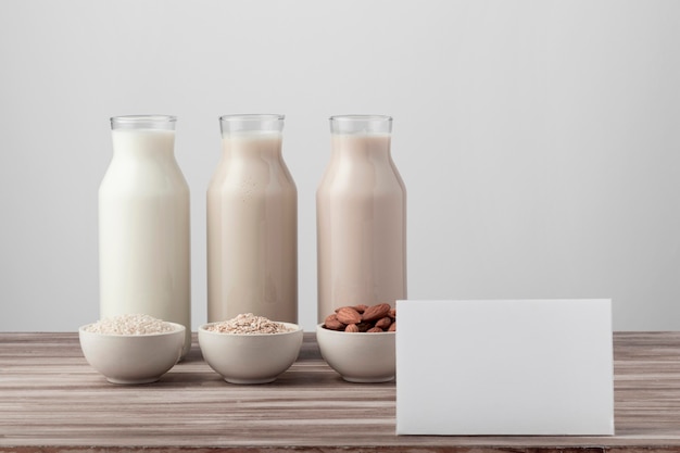 Front view of three bottles with different milk