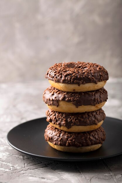 Front view tower assortment with chocolate doughnuts