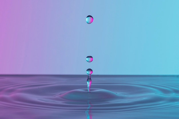 Front view of transparent drops in liquid