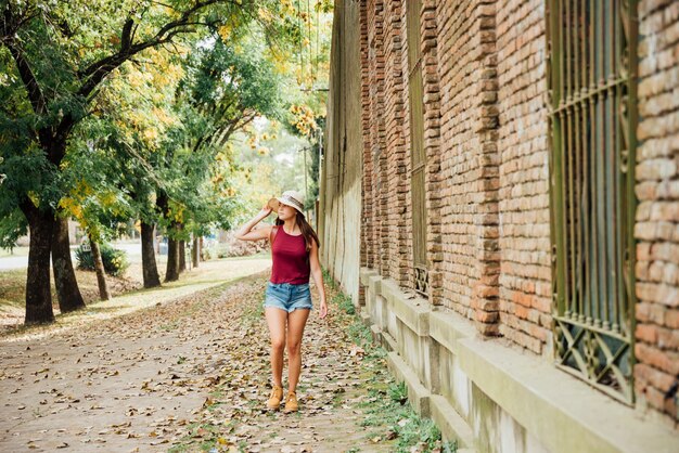 Front view of traveler walking on the sidewalk