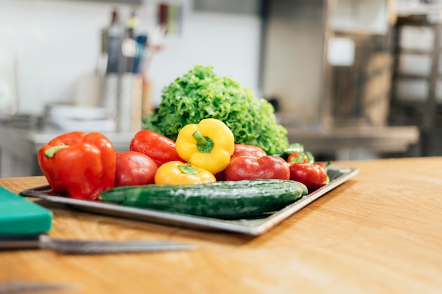 Front view of tray with fresh vegetables