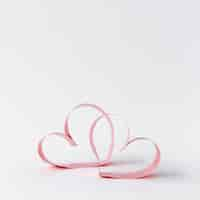 Free photo front view of valentines day paper hearts