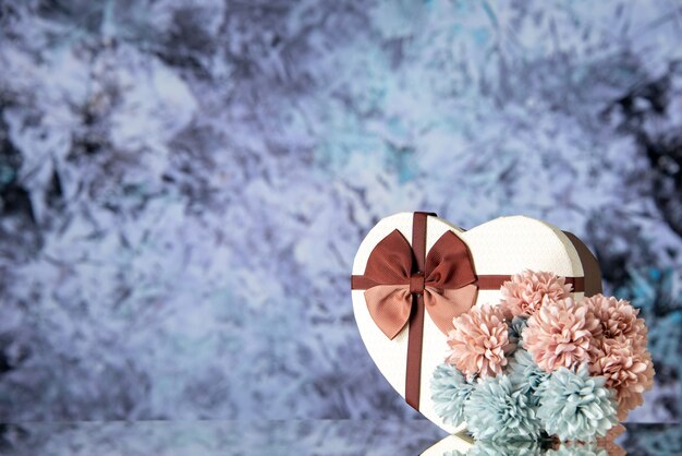 Front view valentines day present with flowers on light background marriage couple feeling family passion love beauty color free space