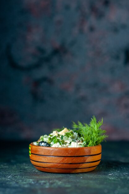 front view vegetable salad with mayyonaise and greens inside little pot on dark background