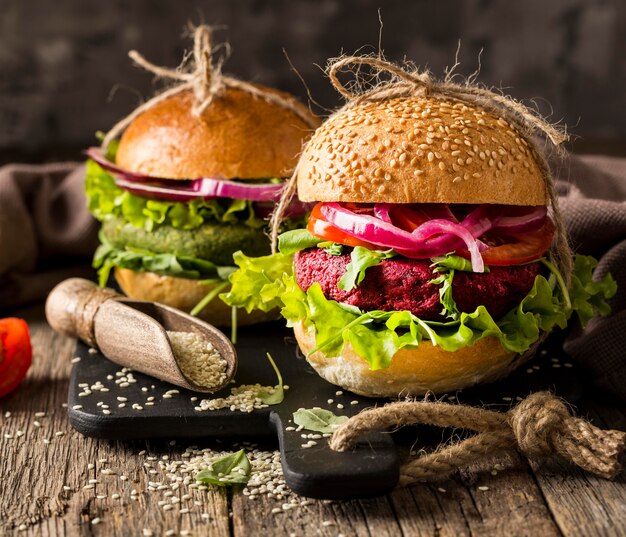 Front view vegetarian burgers on cutting board