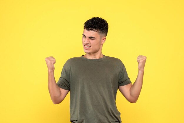 Front view of very happy man waves his arms