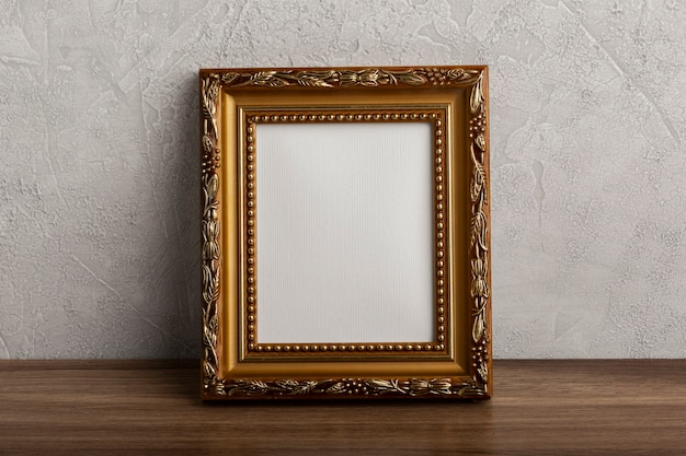 Free photo front view vintage empty frame