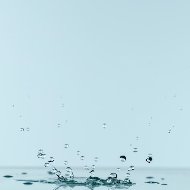 Front view of water drop with copy space