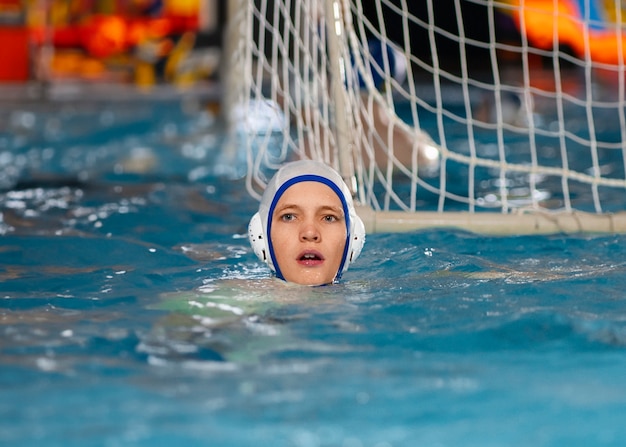 Front view waterpolo  player in pool