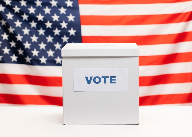 Front view white ballot box and american flag