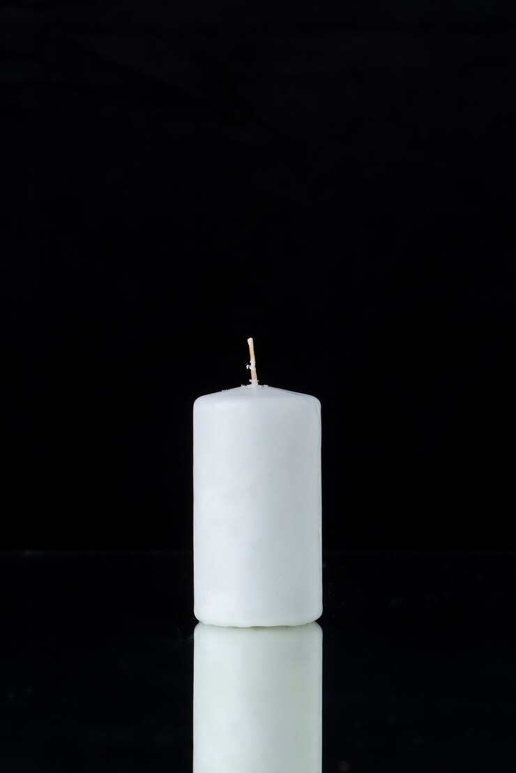 Free Photo front view of white candle on black