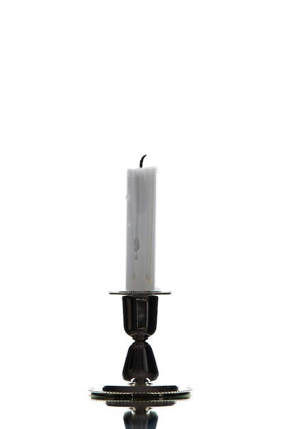 Free photo front view of white candle on white