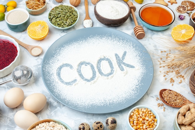 Front view white flour inside plate with nuts seeds and eggs on light background pie nut dough food cake biscuit cook photo color