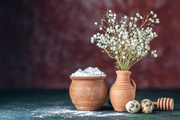 Front view white flowers with quail eggs and flour on dark background beauty tree branch color nature food bird