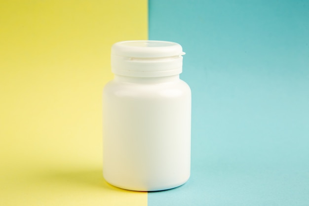 Free photo front view white plastic flask on green-blue background