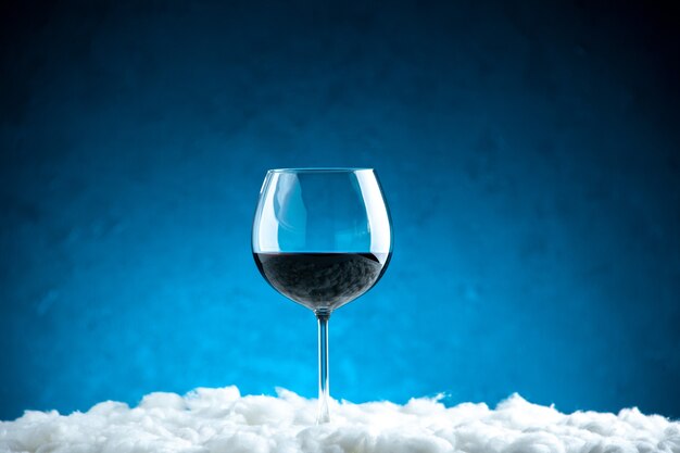 Front view wine glass on blue background