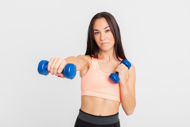 Free photo front view with hand weights exercise