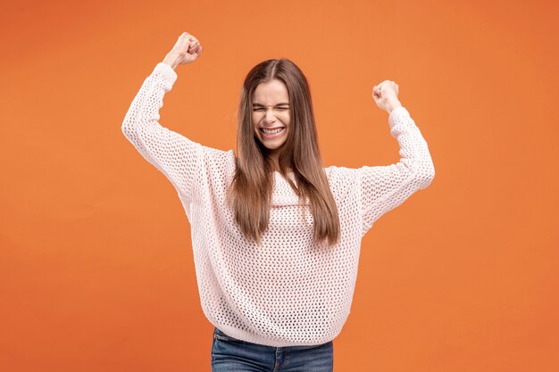 Front view of woman being victorious