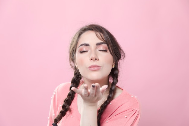 Free photo front view of woman blowing a kiss