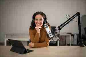 Free photo front view of woman broadcasting on radio