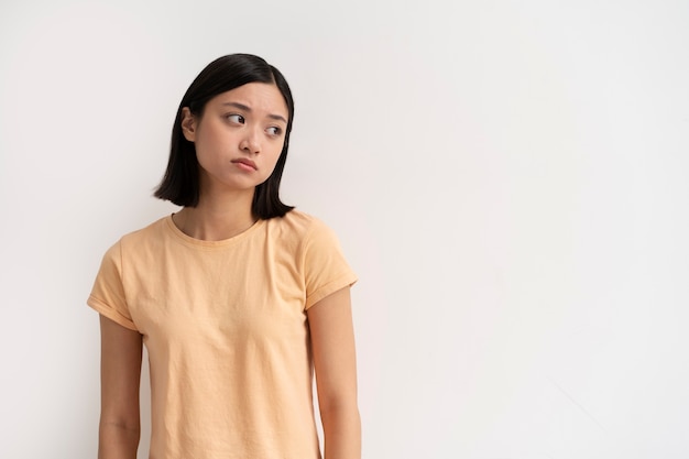 Free photo front view woman dealing with imposter syndrome