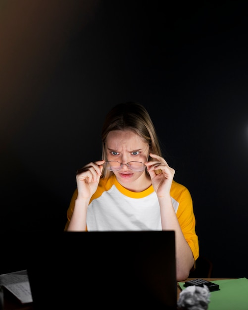 Front view of woman at desk with copy space