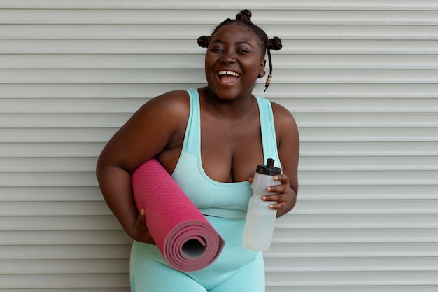 Free photo front view woman doing sport