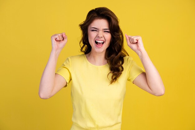 Front view of woman excited about being a winner