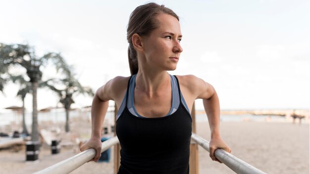 Front view woman exercising in sportswear