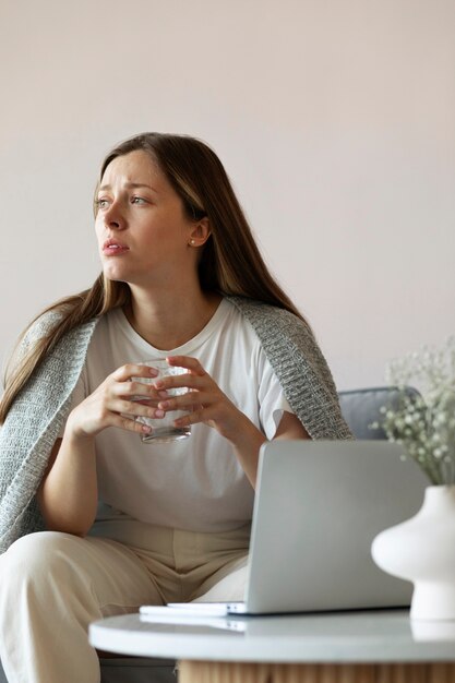 Front view woman experiencing imposter syndrome