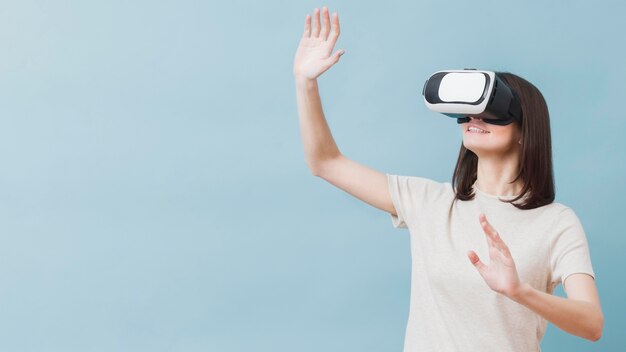 Front view of woman experiencing virtual reality