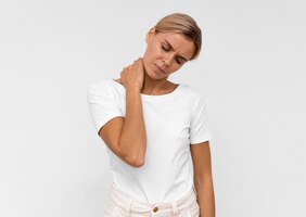 Front view of woman having neck pain
