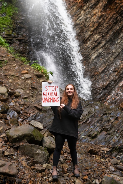 Front view woman holding banner