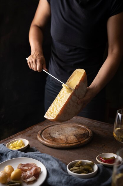 Front view woman holding cheese