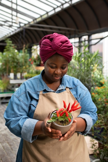 Front view woman holding flowers