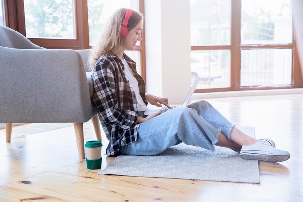 Front view of woman listening to music