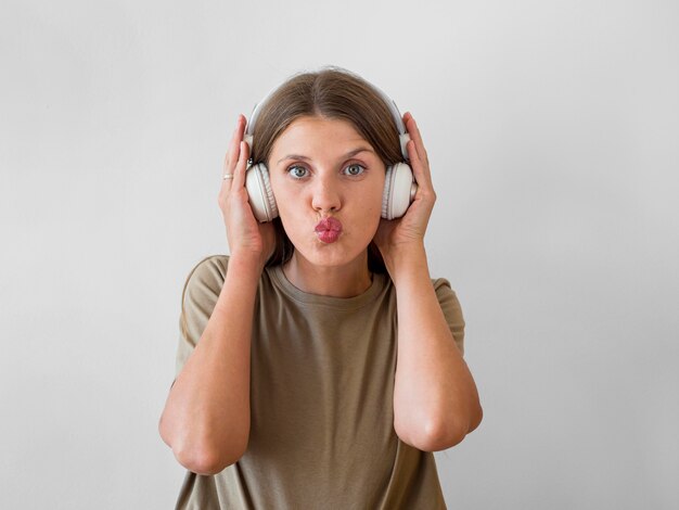 Front view of woman listening to music