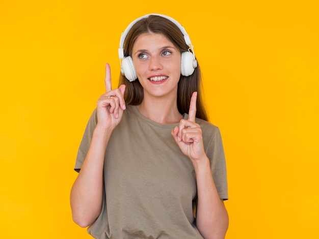 Front view of woman listening to music