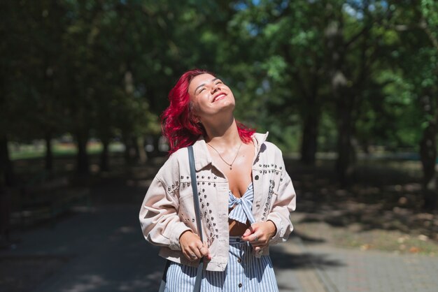 Free photo front view of woman in park