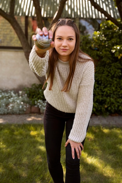 Portrait of cute twelve year old girl in the park. Stock Photo