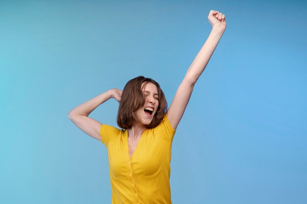 Front view of woman posing while having fun