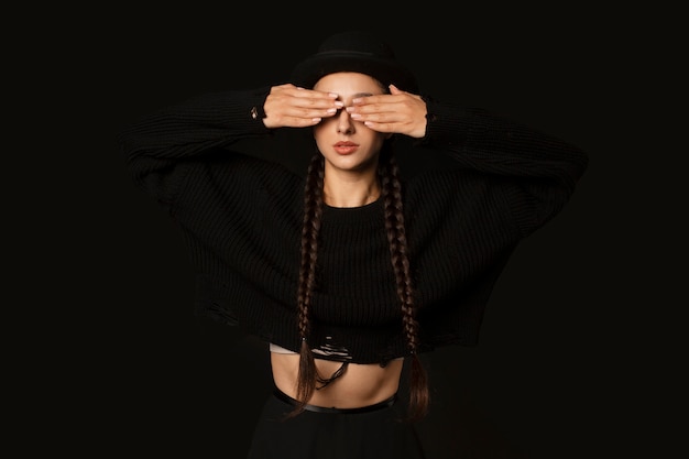 Front view woman posing with black outfit