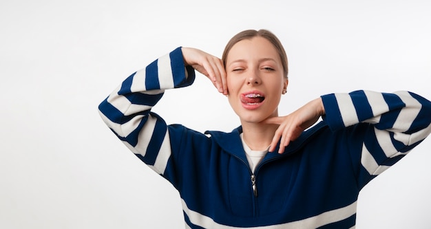 Free photo front view woman posing with dental gems