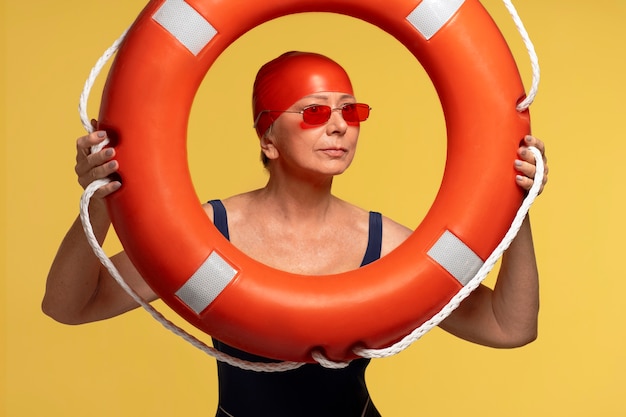 Free photo front view woman posing with lifeline