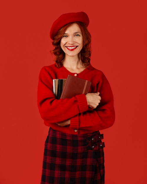 Free photo front view woman posing with red outfit