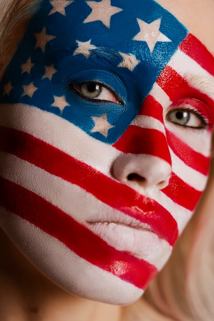 Front view woman posing with usa makeup