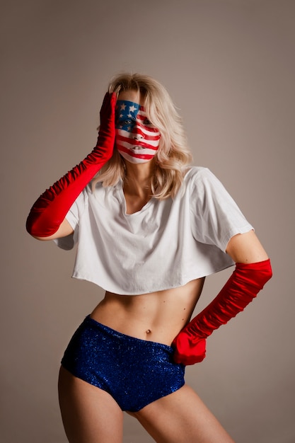 Free photo front view woman posing with usa makeup